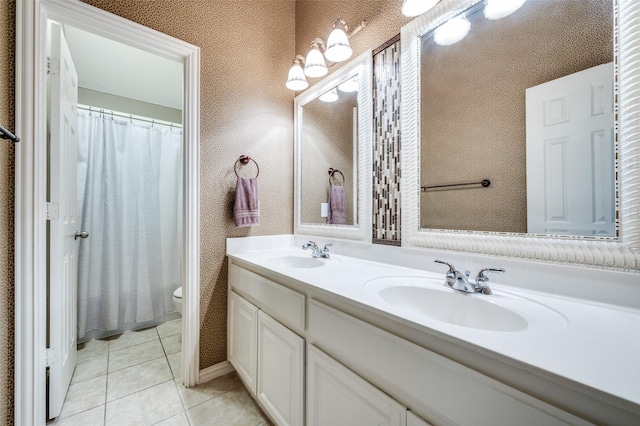417 Fox Trl, Allen, TX 75002 - full bath with double vanity, toilet, tile patterned floors, a shower with shower curtain, and a textured wall