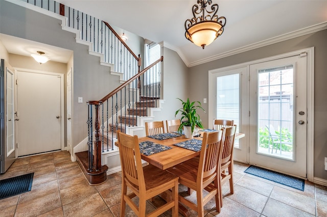 417 Fox Trl, Allen, TX 75002 - dining area with stairs, crown molding, and baseboards