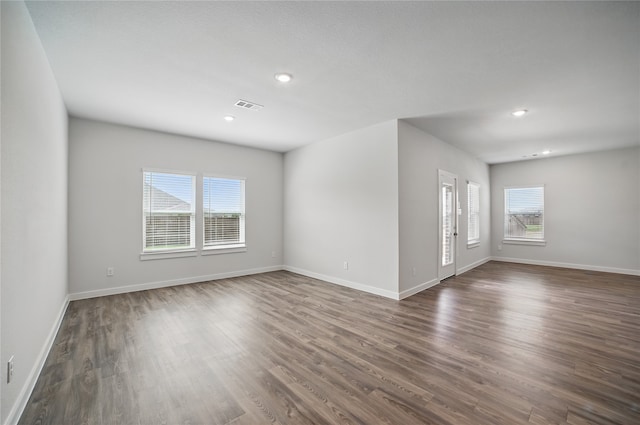 809 Vineyard Way, Forney, TX 75126 - unfurnished room with dark wood-style flooring, baseboards, and recessed lighting