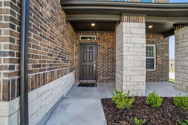 809 Vineyard Way, Forney, TX 75126 - property entrance with brick siding and covered porch