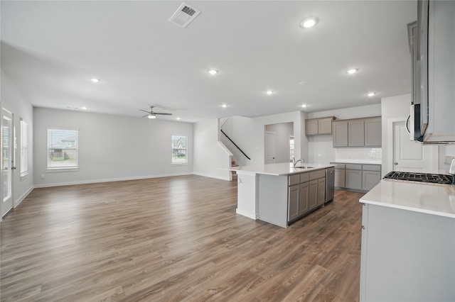 809 Vineyard Way, Forney, TX 75126 - kitchen with a sink, gray cabinets, a ceiling fan, stainless steel appliances, and recessed lighting