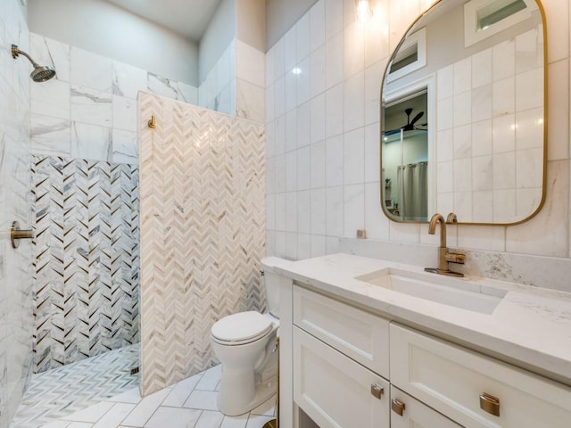 1545 Silver Creek Cir, Lucas, TX 75002 - bathroom featuring tile walls, vanity, toilet, tiled shower, and tile patterned flooring