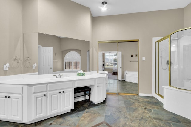 8 Calloway Ct, Mansfield, TX 76063 - full bath featuring a stall shower, vanity, ensuite bathroom, baseboards, and a towering ceiling