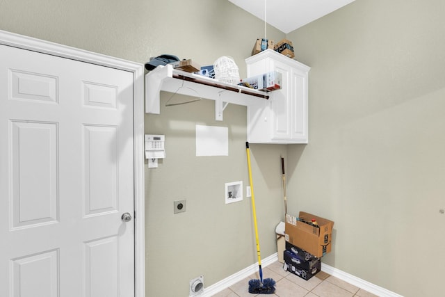 8 Calloway Ct, Mansfield, TX 76063 - laundry room featuring hookup for an electric dryer, cabinet space, washer hookup, baseboards, and light tile patterned flooring