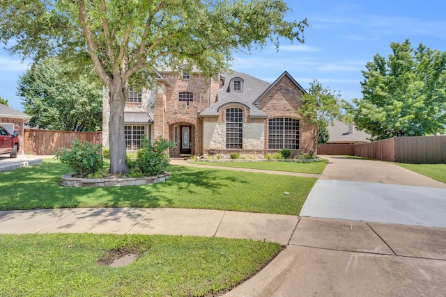 8 Calloway Ct, Mansfield, TX 76063 - french country home featuring stone siding, brick siding, and driveway