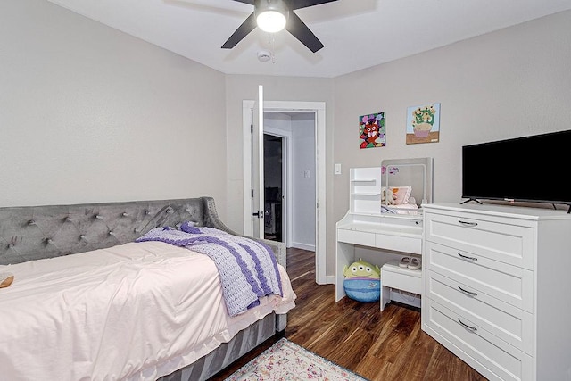 1117 Marcia Ln, Burleson, TX 76028 - bedroom featuring dark wood-style flooring, ceiling fan, and baseboards