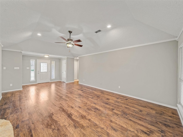 7900 Marsh Ct, Fort Worth, TX 76123 - unfurnished living room featuring a ceiling fan, wood finished floors, baseboards, crown molding, and lofted ceiling