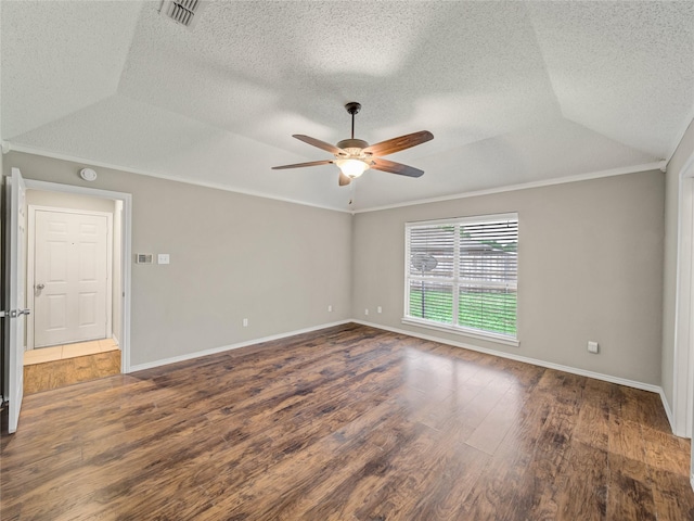 7900 Marsh Ct, Fort Worth, TX 76123 - spare room featuring a ceiling fan, wood finished floors, vaulted ceiling, baseboards, and crown molding