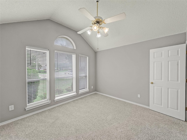 7900 Marsh Ct, Fort Worth, TX 76123 - unfurnished room featuring carpet, vaulted ceiling, ceiling fan, plenty of natural light, and a textured ceiling