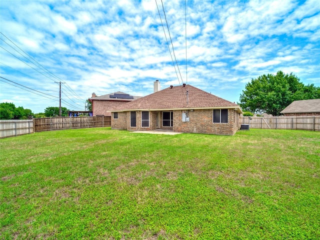 7900 Marsh Ct, Fort Worth, TX 76123 - rear view of property featuring solar panels, brick siding, a patio, and cooling unit