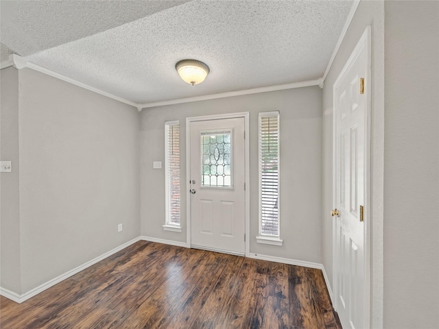 7900 Marsh Ct, Fort Worth, TX 76123 - entrance foyer with dark wood-type flooring, a textured ceiling, ornamental molding, and baseboards