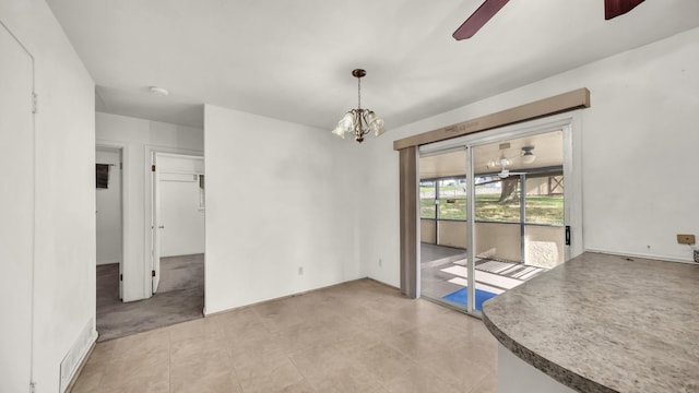 212 E Rentz St, Weatherford, TX 76086 - spare room with ceiling fan, a chandelier, and a smoke detector