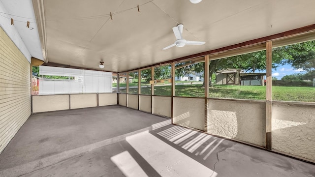 212 E Rentz St, Weatherford, TX 76086 - unfurnished sunroom featuring a ceiling fan