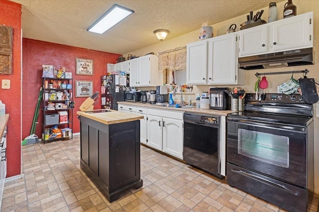 1320 Laredo Dr, Granbury, TX 76048 - kitchen featuring black appliances, under cabinet range hood, white cabinets, brick patterned flooring, and a textured ceiling