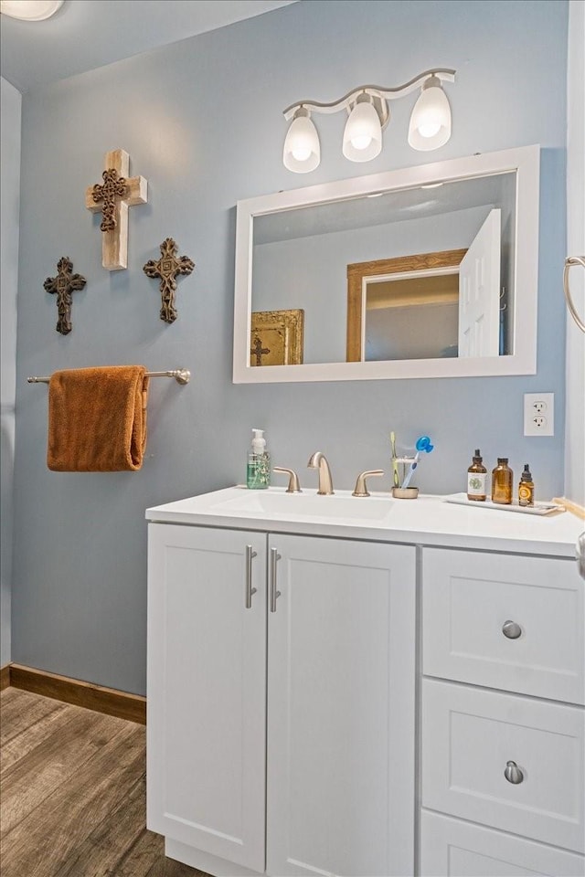 1320 Laredo Dr, Granbury, TX 76048 - bathroom featuring vanity and wood finished floors
