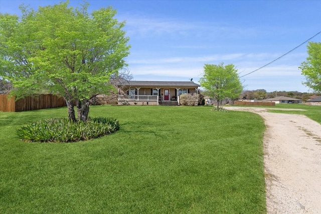 1320 Laredo Dr, Granbury, TX 76048 - ranch-style house with a porch