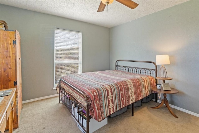 1320 Laredo Dr, Granbury, TX 76048 - carpeted bedroom with a textured ceiling and a ceiling fan