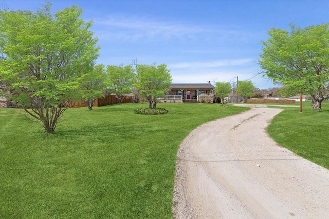 1320 Laredo Dr, Granbury, TX 76048 - ranch-style house with driveway