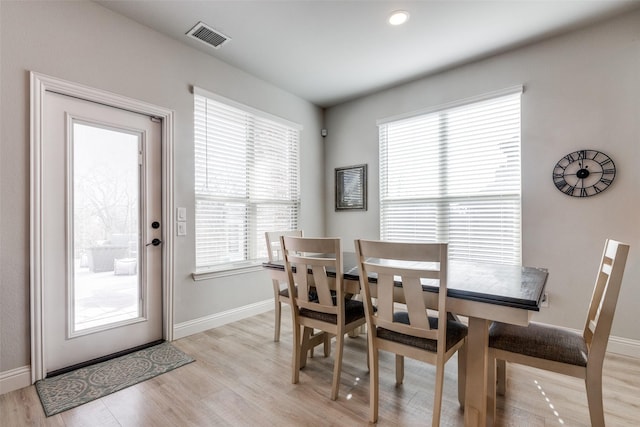 1421 Cedar Creek Dr, Anna, TX 75409 - dining space featuring light wood finished floors and baseboards