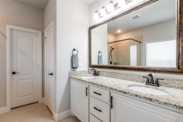 1421 Cedar Creek Dr, Anna, TX 75409 - full bath featuring double vanity, tiled shower, tile patterned floors, and baseboards
