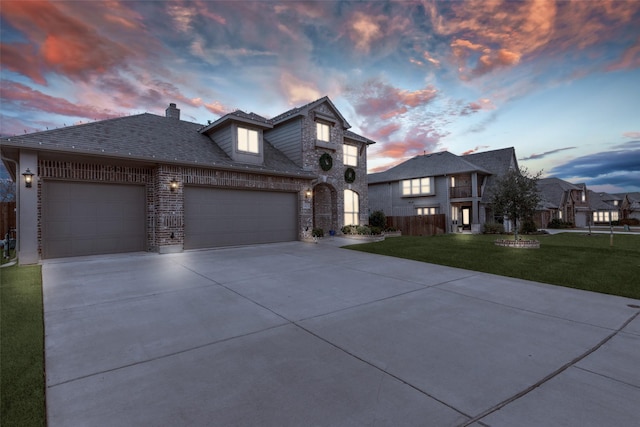 1421 Cedar Creek Dr, Anna, TX 75409 - view of front of home with concrete driveway, an attached garage, a chimney, and brick siding