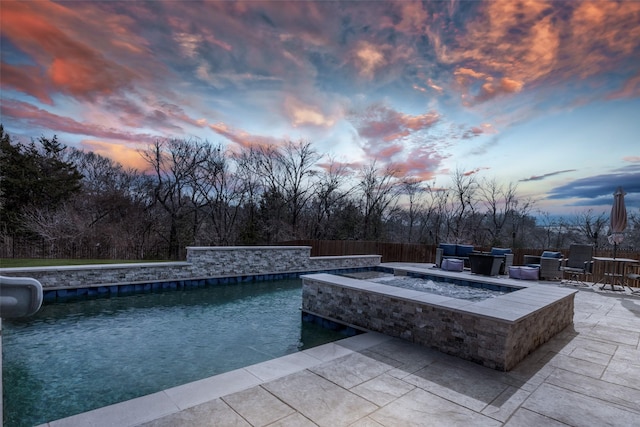 1421 Cedar Creek Dr, Anna, TX 75409 - pool at dusk featuring an outdoor fire pit and a patio