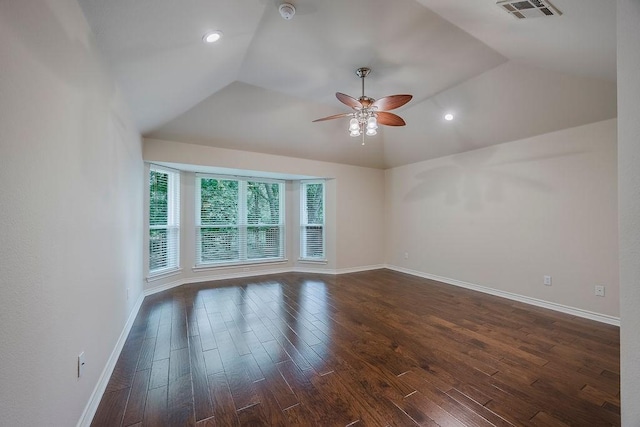 230 Mitchell Blvd, Weatherford, TX 76087 - empty room with vaulted ceiling, a ceiling fan, baseboards, dark wood-style floors, and a smoke detector