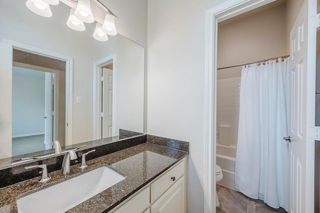 230 Mitchell Blvd, Weatherford, TX 76087 - full bathroom featuring vanity, toilet, and shower / bath combo with shower curtain