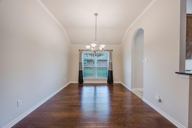 230 Mitchell Blvd, Weatherford, TX 76087 - unfurnished dining area featuring dark wood-style flooring, crown molding, arched walkways, vaulted ceiling, and a chandelier