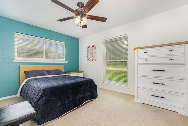 1621 Villanova Dr, Richardson, TX 75081 - bedroom featuring light colored carpet, a ceiling fan, and baseboards