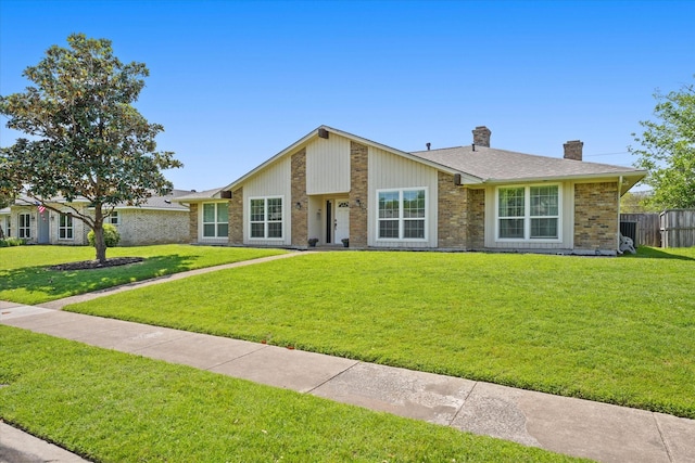 3701 Knob Hill Dr, Plano, TX 75023 - mid-century inspired home featuring a chimney and brick siding