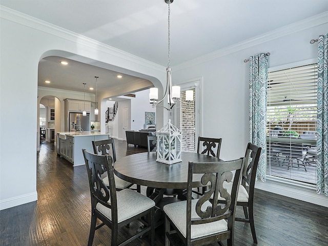 1551 Sweetwater Ln, Prosper, TX 75078 - dining space featuring arched walkways, healthy amount of natural light, dark wood-style flooring, ornamental molding, and stairs