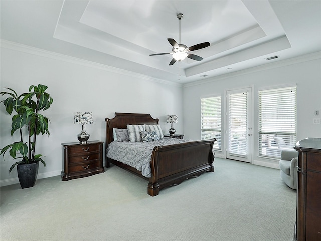 1551 Sweetwater Ln, Prosper, TX 75078 - bedroom with a tray ceiling, light colored carpet, access to exterior, ceiling fan, and ornamental molding