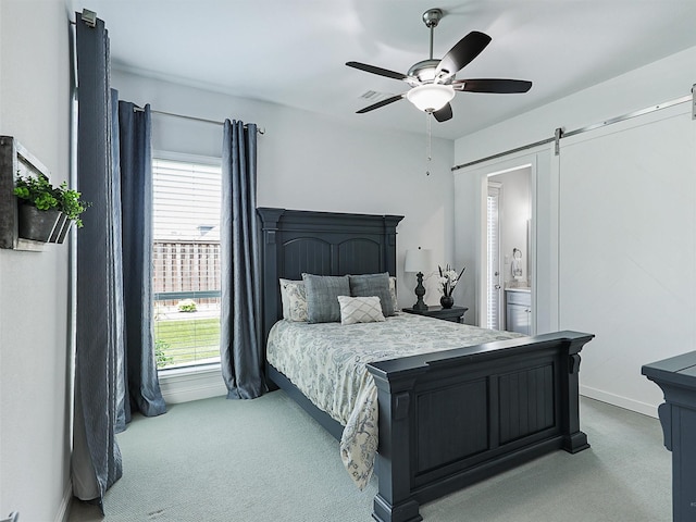 1551 Sweetwater Ln, Prosper, TX 75078 - bedroom featuring carpet flooring, multiple windows, a barn door, and connected bathroom