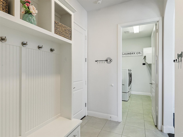 1551 Sweetwater Ln, Prosper, TX 75078 - mudroom with independent washer and dryer and light tile patterned flooring