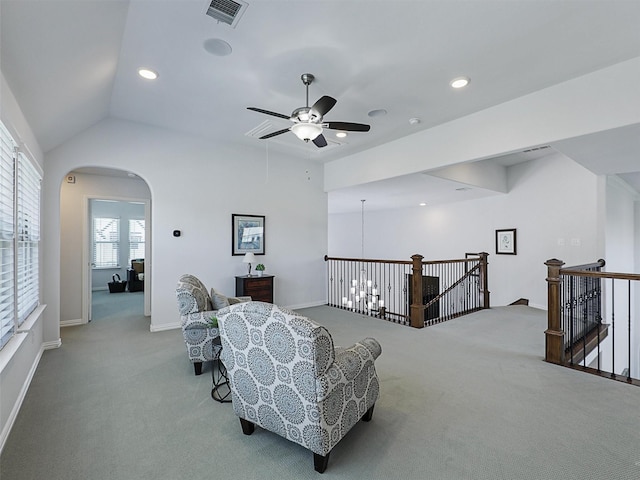 1551 Sweetwater Ln, Prosper, TX 75078 - sitting room featuring an upstairs landing, carpet floors, ceiling fan, arched walkways, and lofted ceiling