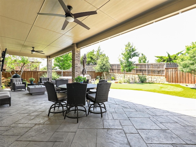 1551 Sweetwater Ln, Prosper, TX 75078 - fenced backyard with a ceiling fan, an outdoor living space, a patio area, and outdoor dining space