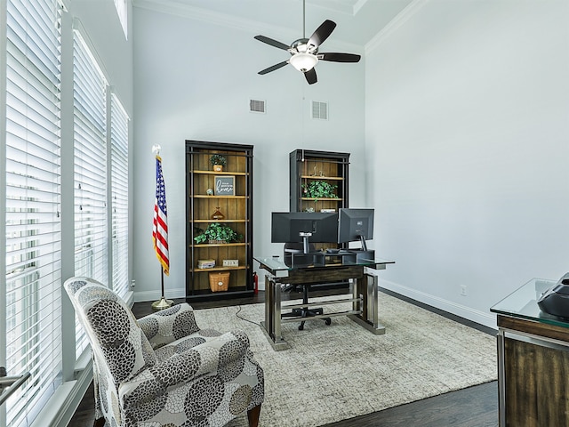 1551 Sweetwater Ln, Prosper, TX 75078 - home office with wood finished floors, a high ceiling, ornamental molding, and a ceiling fan