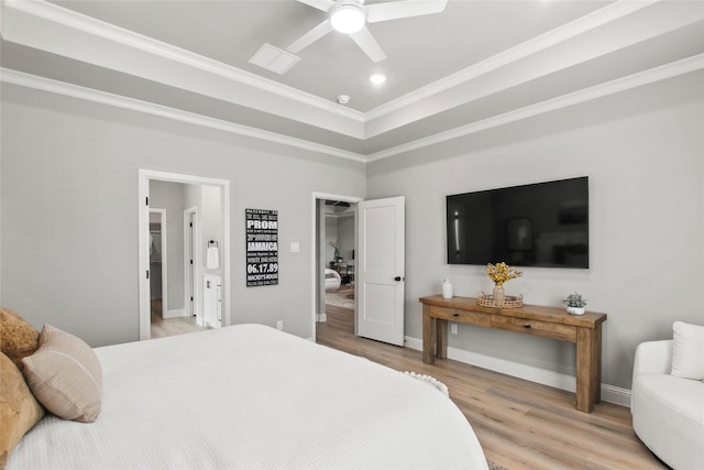 80 Dublin Cir, Gordonville, TX 76245 - bedroom featuring light wood-style floors, crown molding, recessed lighting, a tray ceiling, and baseboards