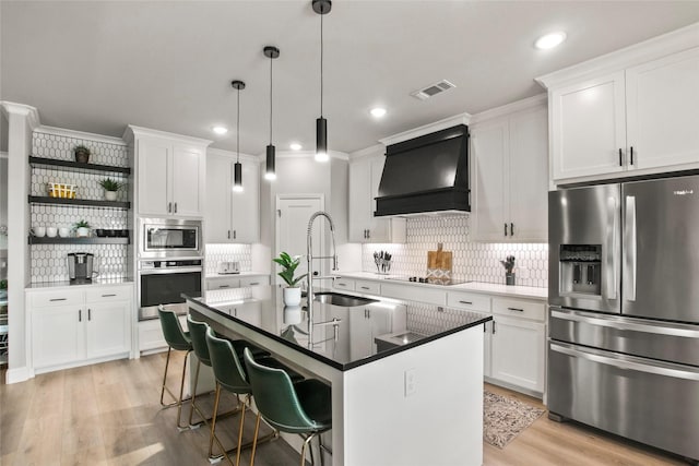 80 Dublin Cir, Gordonville, TX 76245 - kitchen with stainless steel appliances, a sink, premium range hood, open shelves, and tasteful backsplash