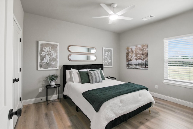 80 Dublin Cir, Gordonville, TX 76245 - bedroom featuring light wood-style floors, baseboards, and a ceiling fan