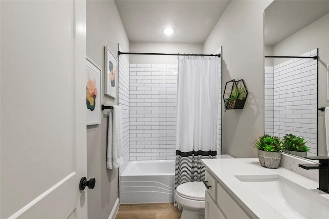 80 Dublin Cir, Gordonville, TX 76245 - bathroom featuring vanity, shower / bath combo, toilet, and wood finished floors