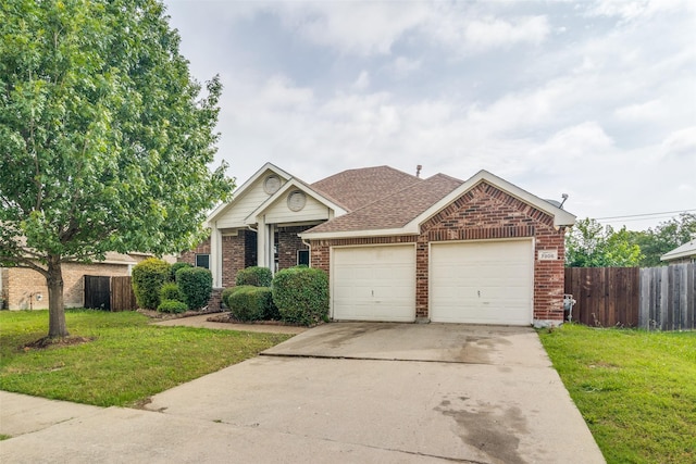 7806 Albany Dr, Rowlett, TX 75089 - view of front of property featuring brick siding, an attached garage, driveway, and a shingled roof