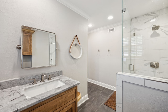 6443 Velasco Ave, Dallas, TX 75214 - bathroom featuring ornamental molding, vanity, marble look tiles, a shower stall, and baseboards