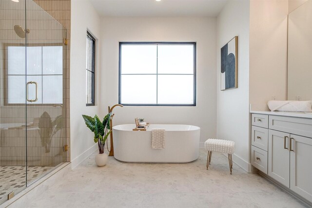 4513 Fair Creek Ter, Fort Worth, TX 76008 - full bath featuring a shower stall, a freestanding tub, vanity, and baseboards
