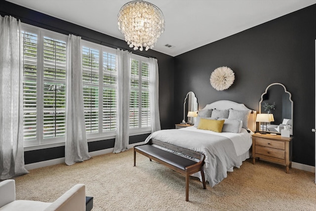 9008 Cypress Creek Rd, Lantana, TX 76226 - bedroom with a chandelier, baseboards, and carpet floors