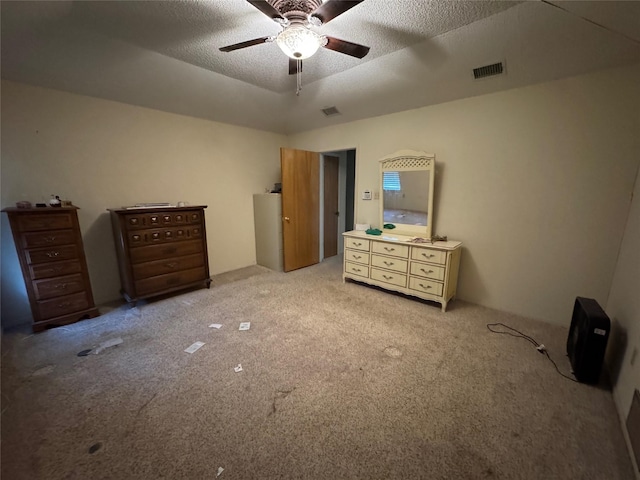 1402 Clarks Dr, Abilene, TX 79602 - bedroom with light colored carpet, ceiling fan, and a textured ceiling