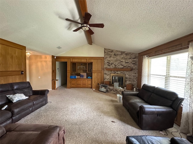 1402 Clarks Dr, Abilene, TX 79602 - living room with a ceiling fan, a textured ceiling, light carpet, a fireplace, and wood walls