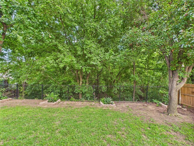 1308 Rambling Brook Trl, Denton, TX 76210 - living area featuring ceiling fan, dark wood finished floors, and baseboards