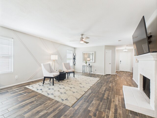 1308 Rambling Brook Trl, Denton, TX 76210 - living area with wood finished floors, ceiling fan, and baseboards